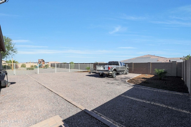 view of parking / parking lot featuring a playground