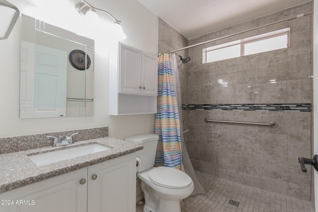 bathroom with vanity, a shower with curtain, and toilet