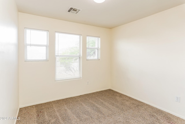 spare room with carpet floors