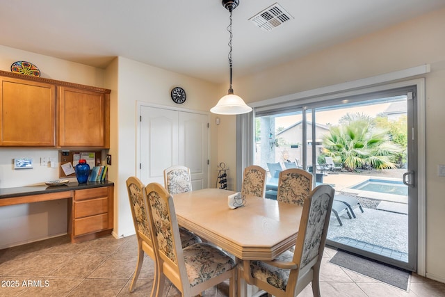 view of tiled dining room