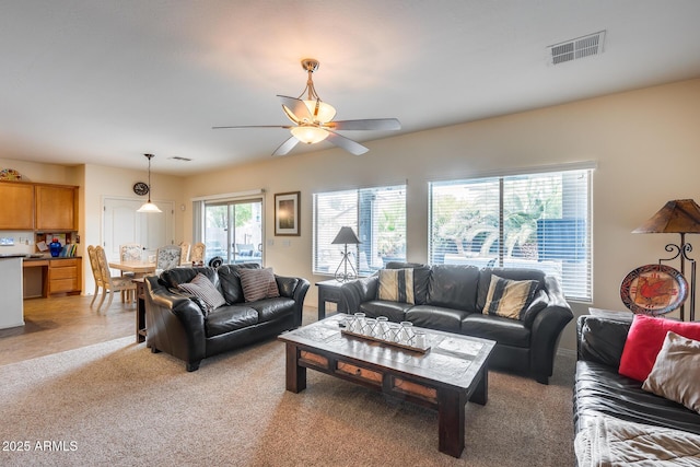 living room with ceiling fan