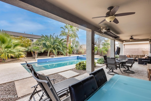 view of patio with outdoor lounge area and ceiling fan