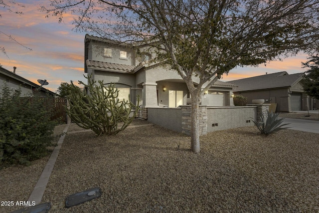 view of front of property featuring a garage