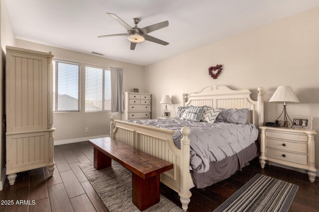 4834 E Robin Ln, Phoenix, AZ 85054 - bedroom featuring wood finish floors, baseboards, and ceiling fan