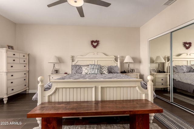 4834 E Robin Ln, Phoenix, AZ 85054 - bedroom featuring dark wood finished floors, a closet, and ceiling fan