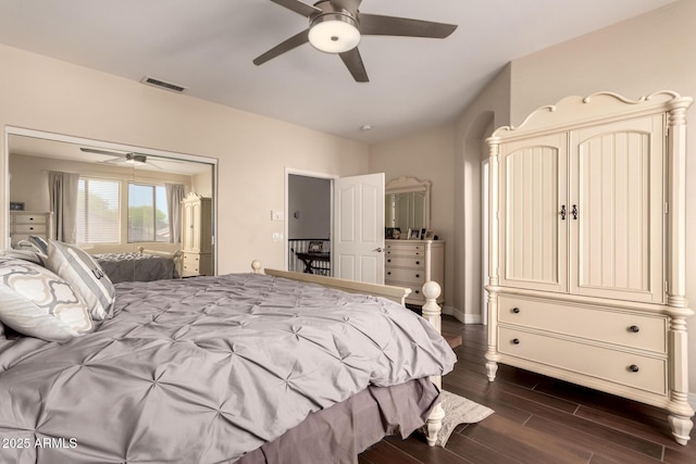 4834 E Robin Ln, Phoenix, AZ 85054 - bedroom featuring dark wood-style floors, a ceiling fan, and baseboards