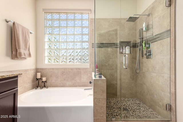 4834 E Robin Ln, Phoenix, AZ 85054 - full bath featuring a garden tub and a stall shower