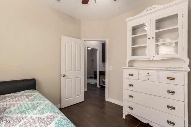 4834 E Robin Ln, Phoenix, AZ 85054 - bedroom featuring baseboards, dark wood finished floors, and ceiling fan