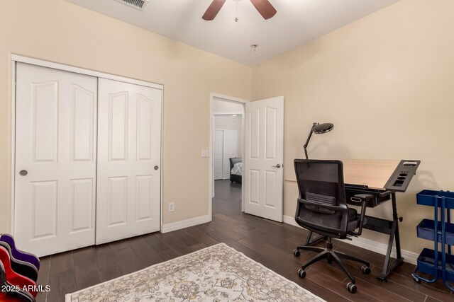 4834 E Robin Ln, Phoenix, AZ 85054 - office area with dark wood finished floors, a ceiling fan, and baseboards