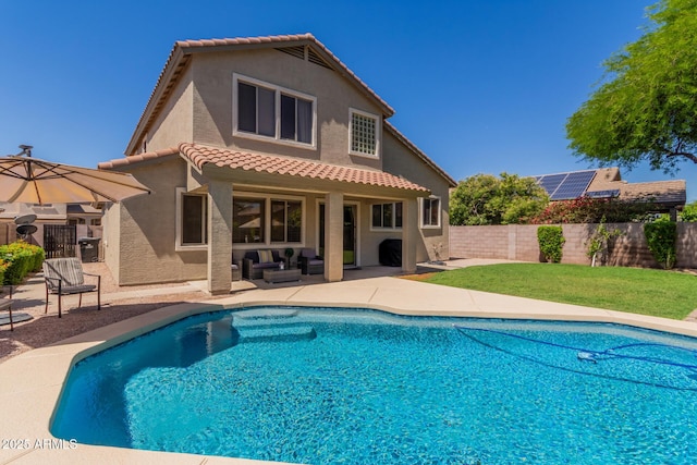 4834 E Robin Ln, Phoenix, AZ 85054 - view of swimming pool with outdoor lounge area, a fenced backyard, and a patio area