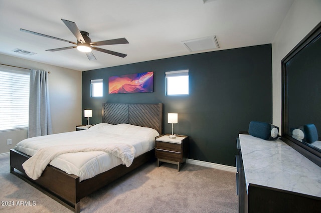 carpeted bedroom featuring ceiling fan