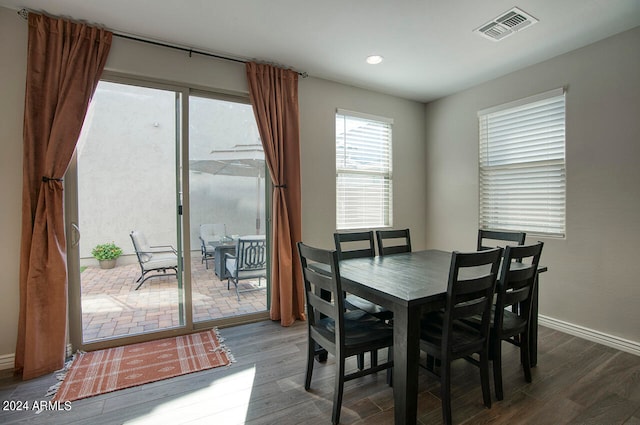 dining room featuring dark wood-type flooring