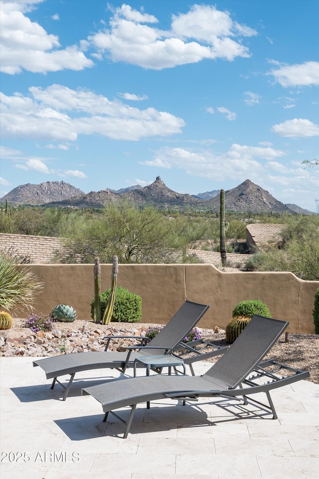 8400 E Dixileta Dr Unit 153, Scottsdale, AZ 85266 - view of patio / terrace with fence and a mountain view