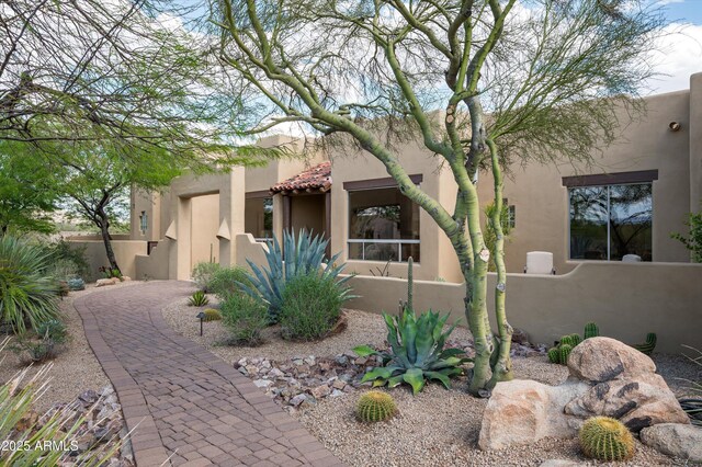 8400 E Dixileta Dr Unit 153, Scottsdale, AZ 85266 - view of side of home with fence and stucco siding