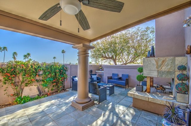 view of patio with a fenced backyard, an outdoor hangout area, and ceiling fan