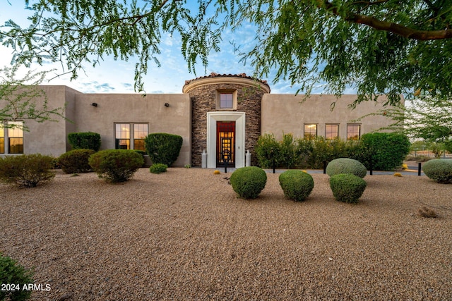 8742 E Villa Cassandra Dr, Scottsdale, AZ 85266 - southwest-style home with stone siding, stucco siding, and french doors