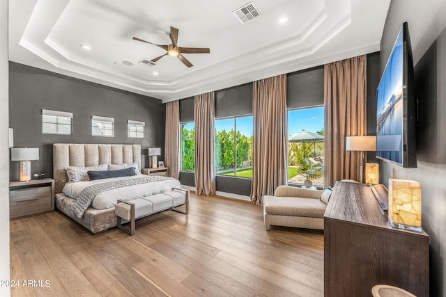 8742 E Villa Cassandra Dr, Scottsdale, AZ 85266 - bedroom featuring recessed lighting, a tray ceiling, and visible vents