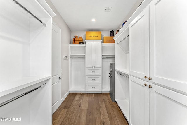 walk in closet featuring wood-type flooring