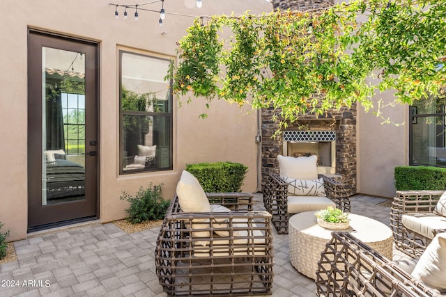 8742 E Villa Cassandra Dr, Scottsdale, AZ 85266 - view of patio / terrace featuring an outdoor living space