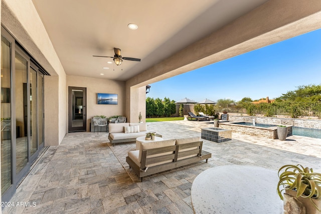 8742 E Villa Cassandra Dr, Scottsdale, AZ 85266 - view of patio / terrace featuring ceiling fan, a fenced backyard, a fenced in pool, and an outdoor living space