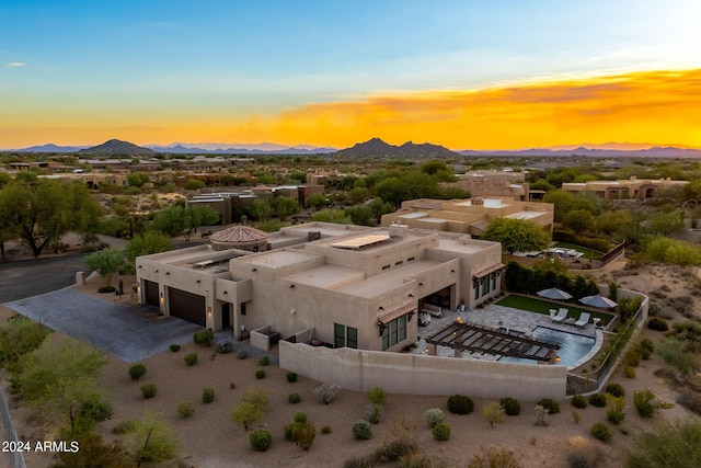 aerial view at dusk with a mountain view