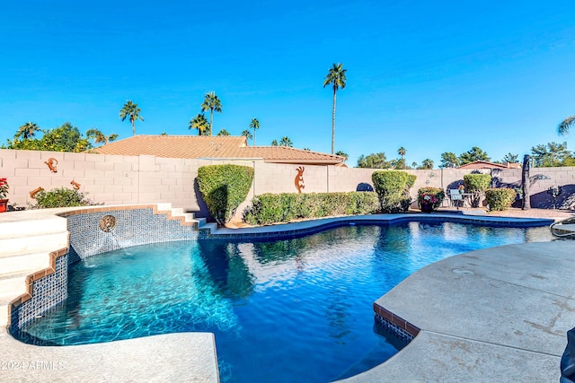 view of pool featuring pool water feature