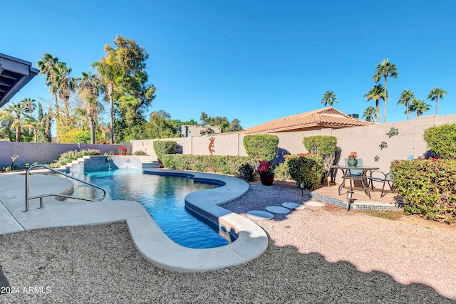 view of pool featuring a patio area