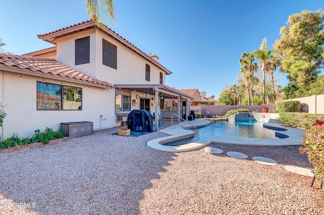 view of swimming pool featuring a patio and a grill