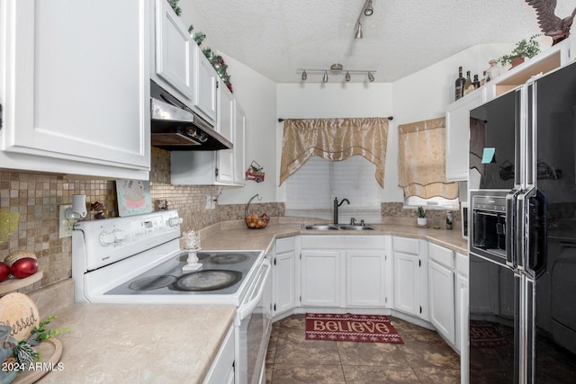 kitchen featuring sink, rail lighting, white electric stove, black fridge with ice dispenser, and white cabinets