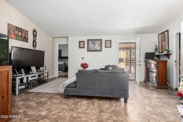 living room with a textured ceiling