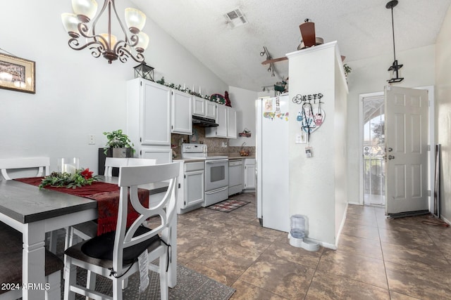 kitchen featuring white cabinets, white appliances, hanging light fixtures, and lofted ceiling