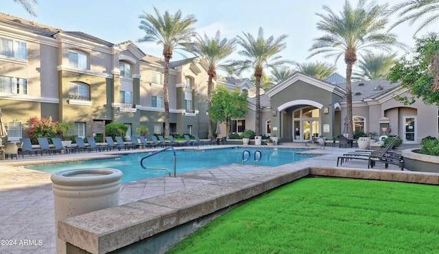 view of pool featuring a patio area