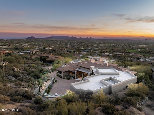 aerial view at dusk with a mountain view