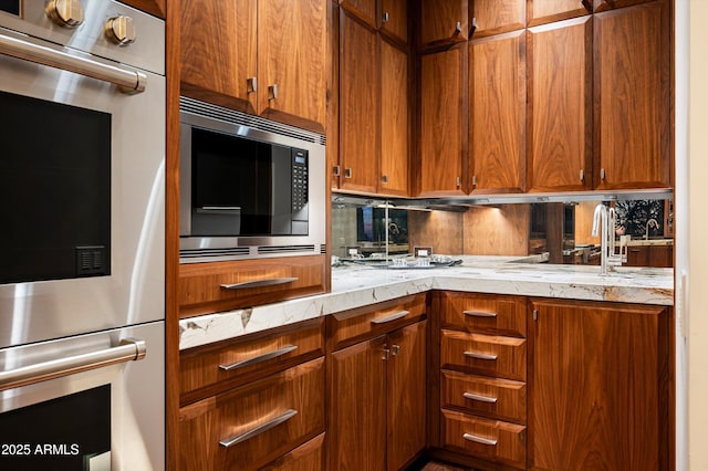 kitchen featuring sink and appliances with stainless steel finishes