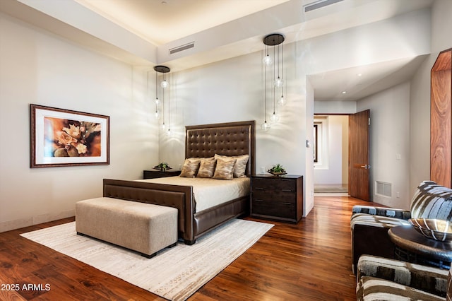 bedroom featuring dark wood-type flooring