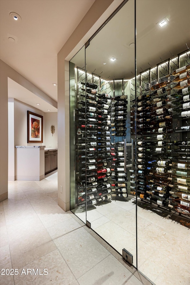 wine area with light tile patterned floors and electric panel