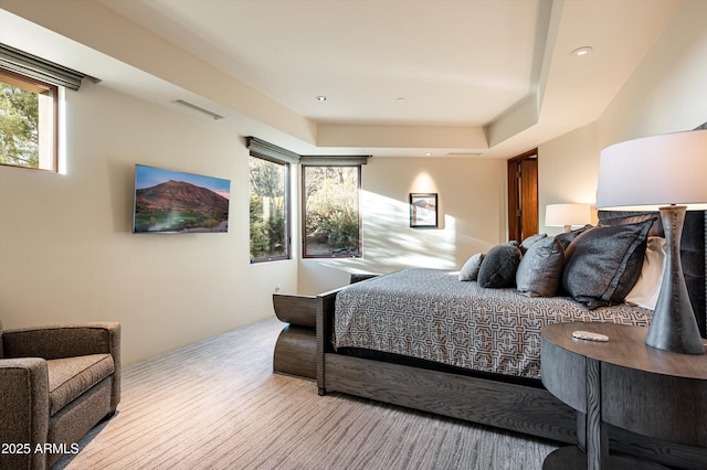 bedroom featuring multiple windows