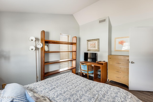 bedroom featuring lofted ceiling