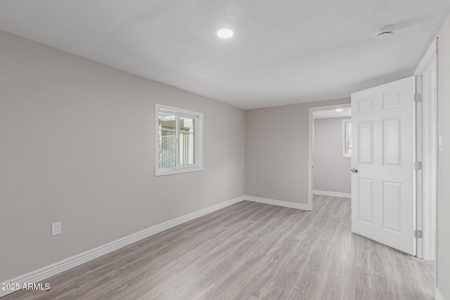 empty room featuring light hardwood / wood-style flooring