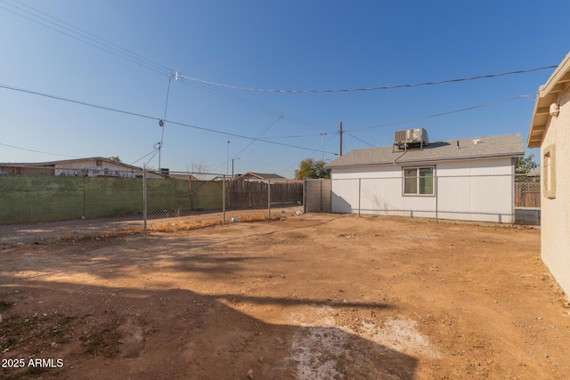 view of yard featuring central AC