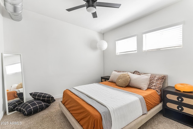 1212 E Indianola Ave, Phoenix, AZ 85014 - bedroom with carpet, baseboards, and ceiling fan