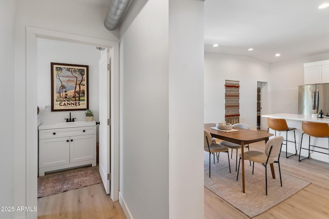 1212 E Indianola Ave, Phoenix, AZ 85014 - dining space featuring light wood-type flooring and recessed lighting