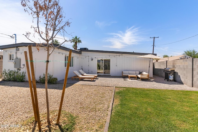 1212 E Indianola Ave, Phoenix, AZ 85014 - back of property with a yard, a patio area, fence, and an outdoor living space