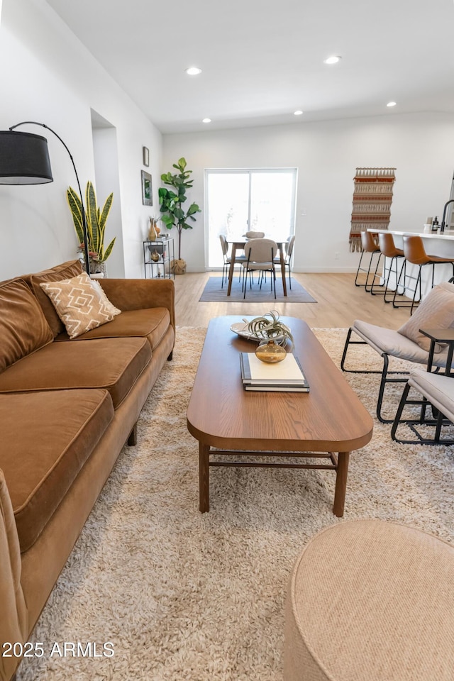 1212 E Indianola Ave, Phoenix, AZ 85014 - living room featuring light wood-style flooring and recessed lighting