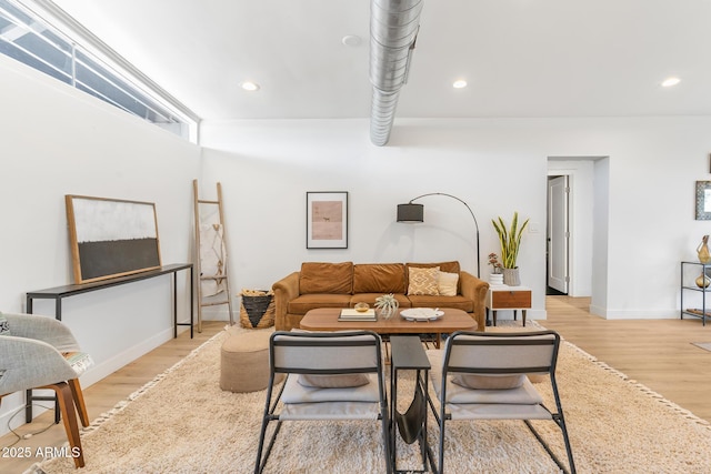 1212 E Indianola Ave, Phoenix, AZ 85014 - living room featuring light wood-type flooring, baseboards, and recessed lighting
