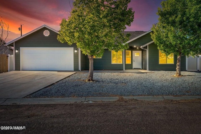 780 E Cobble Ln, Taylor, AZ 85939 - view of front of home featuring an attached garage and driveway