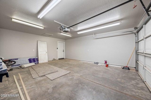 780 E Cobble Ln, Taylor, AZ 85939 - garage featuring a garage door opener