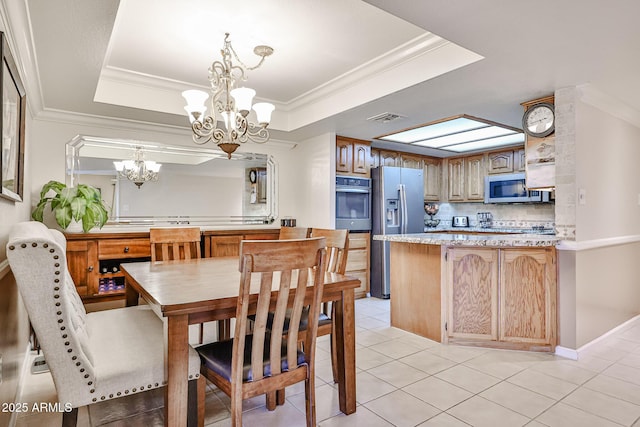 17404 N 99th Ave Unit 318, Sun City, AZ 85373 - dining space with a notable chandelier, light tile patterned floors, crown molding, visible vents, and a tray ceiling