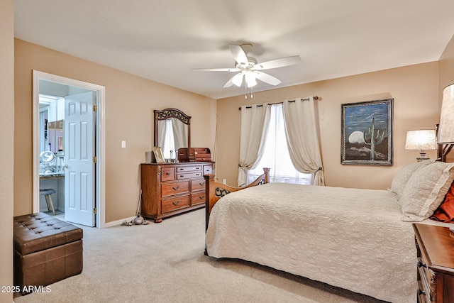 17404 N 99th Ave Unit 318, Sun City, AZ 85373 - carpeted bedroom featuring baseboards and a ceiling fan