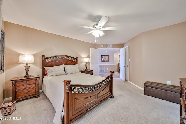 17404 N 99th Ave Unit 318, Sun City, AZ 85373 - bedroom with visible vents, light colored carpet, and baseboards
